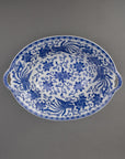 Blue and white oval serving bowls with cut out handles. Phoenix Pattern. Made in Japan.