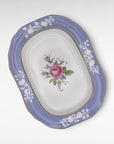 The Brooklyn Teacup Spode Maritime Rose 12-inch platter featuring a pink rose center and periwinkle blue border.