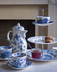 Handcrafted blue and white 3-tier tea tray with teacup top, perfect for tea parties
