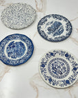 1 floral pattern, 2 colonial patterns and 1 blue onion pattern - example of mismatched set of 4 in the gracious bread & butter plate set