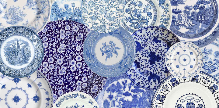 blue and white transferware plates overlapping in many different patterns