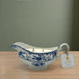 Blue and white vintage porcelain gravy boat candle with hand-poured vegan soy wax.
