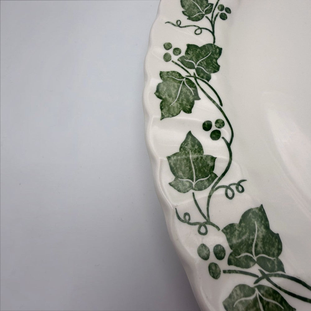 The Brooklyn Teacup Churchill Ivy oval serving platter with green botanical leaf pattern on white scalloped ceramic