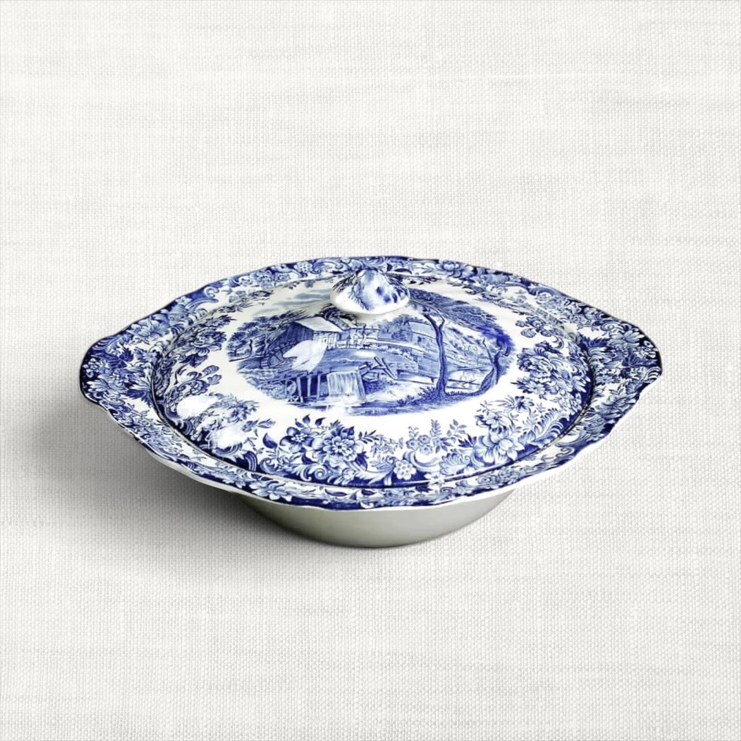 Vintage Johnson Bros. earthenware covered vegetable bowl in blue and white Millstream pattern.