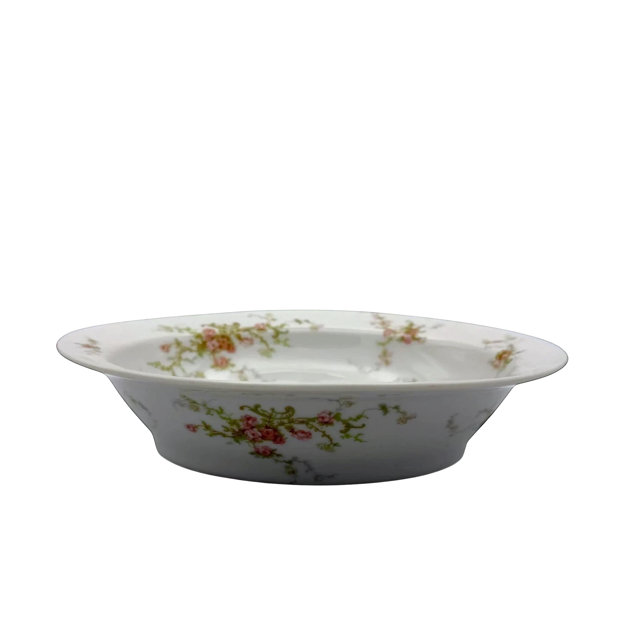 The Brooklyn Teacup oval porcelain serving bowl featuring a delicate pink floral pattern on a white background.