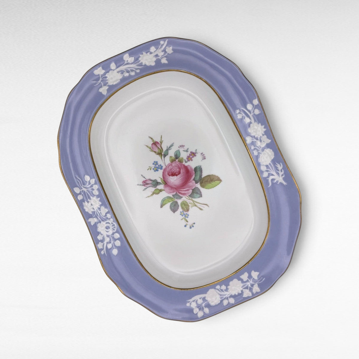 The Brooklyn Teacup Spode Maritime Rose 12-inch platter featuring a pink rose center and periwinkle blue border.
