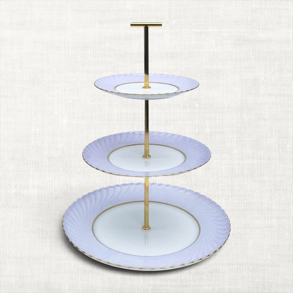 The Brooklyn Teacup custom three-tier serving tray made from three vintage plates with gold hardware