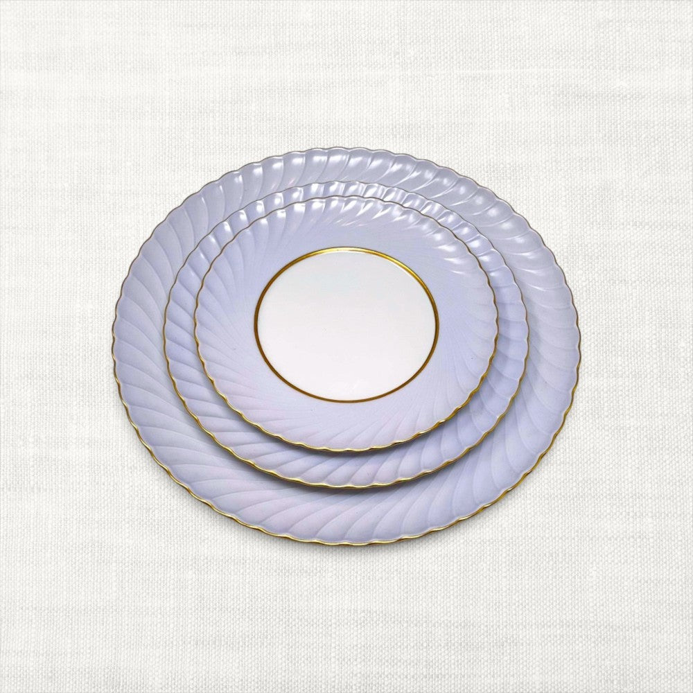 The Brooklyn Teacup three-tier tray starter package featuring three stacked white plates with gold rims and scalloped edges.