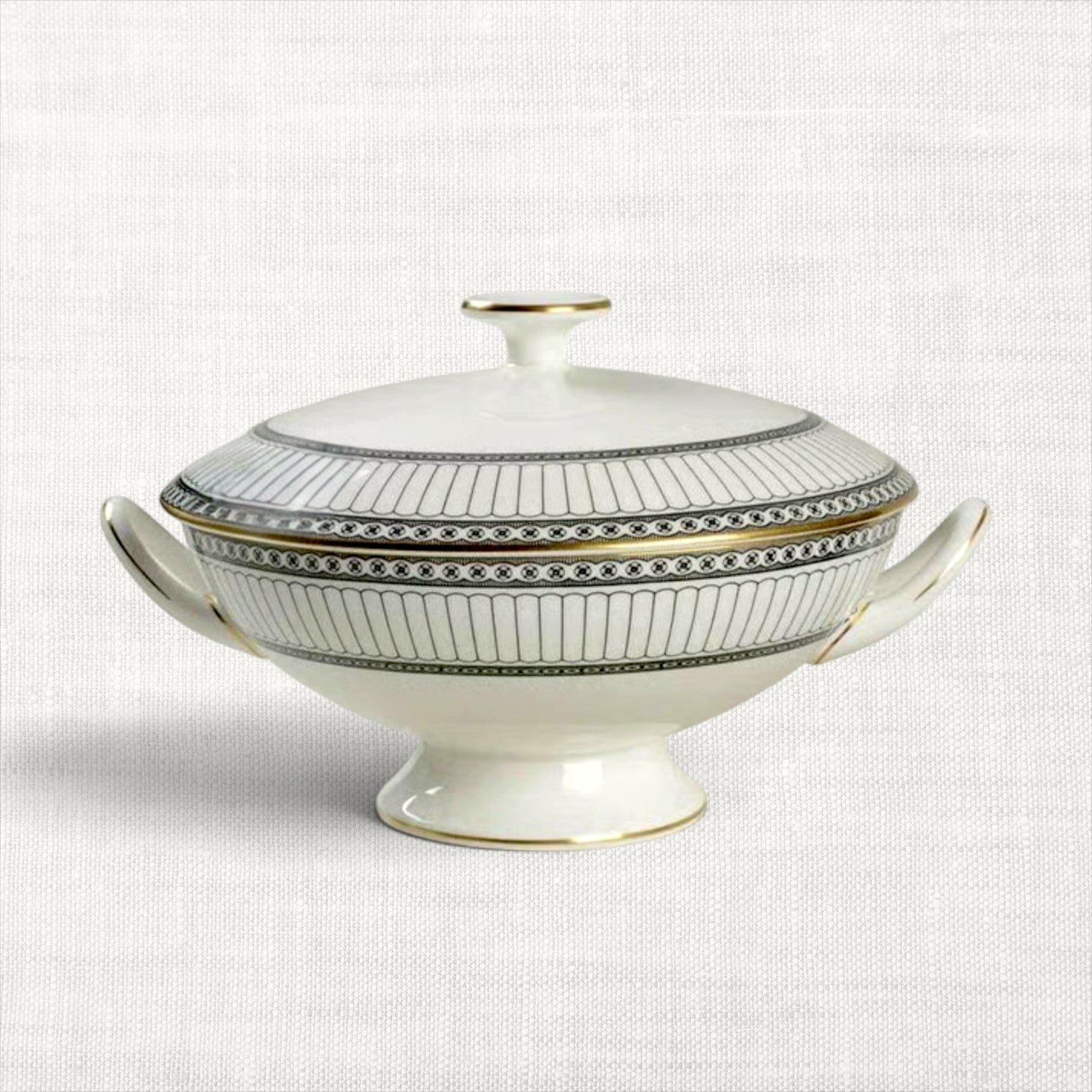 The Brooklyn Teacup Wedgwood Colonnade covered serving bowl in white porcelain with black geometric trim and gold edges