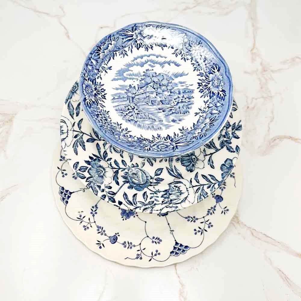 An example of 3 Tiered Serving Trays - blue and white patterns with floral, nordic-inspired and colonial motifs